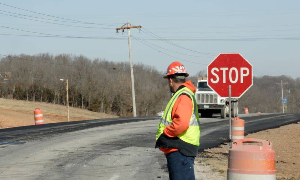 Lane closure roadwork crew - ALTA SURVEY Colorado A roadwork crew manages a lane closure while traffic engineers guide safety and traffic flow on the site